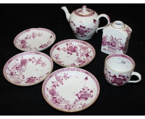 A Meissen part tea service with puce and gilt floral spray decoration on a ribbed body comprising teapot, tea caddy, four sau