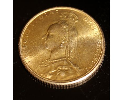 A Victorian sovereign dated 1891 CONDITION REPORTS It is in circulated condition. Some light scratches through out. See image