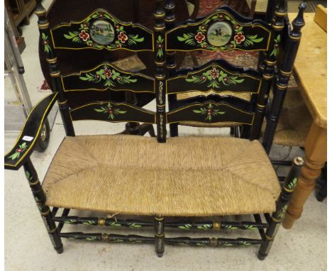A set of seven blue painted ladder back dining chairs with rush seats together with a black ground painted and decorated to s