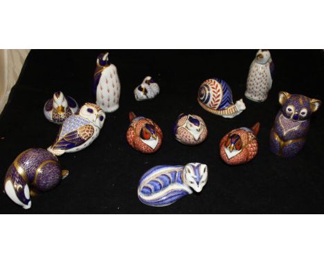 A collection of eleven Royal Crown Derby Japan pattern figures including a pair of Golden Pheasant, Snail, Penguin, Mandarin 