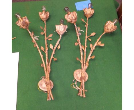 A pair of white painted three branch wall light fittings as roses