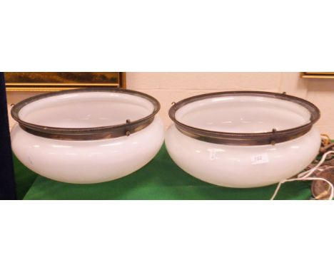 A pair of early 20th Century opaque glass ceiling light shades in the Art Deco manner