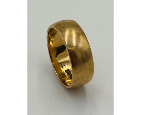 9ct gold band, 7.4g, size S. Estimate: £130-150.This item qualifies for in-house posting.