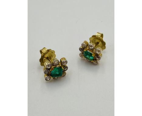 Pair of 9ct gold, diamond and emerald earrings, 5.5g. Estimate: £90-120.This item qualifies for in-house posting.