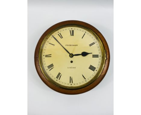 A circular Mahogany TT painted face wall clock with a fusee movement, pendulum present, the dial signed Frodsham, London, 14.