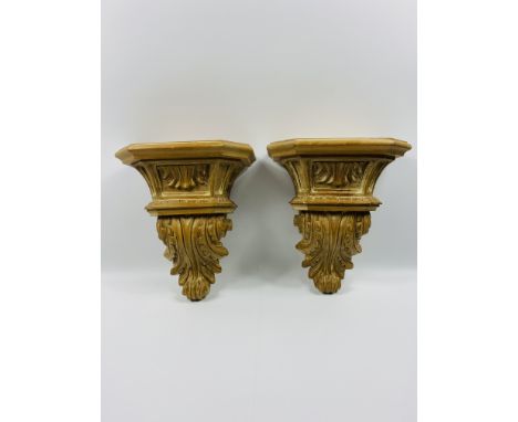 A pair of carved wood wall hanging sconces with Acanthus leaf carved decoration throughout, 30 x 17 x 34.5cms. Estimate £30-4
