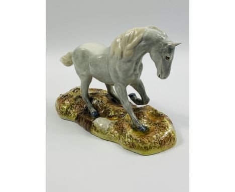 A boxed Beswick limited sculpture Camargue Wild Horse, 467/1000, 25.5 x 10 x 16cms. Estimate £30-40.This item qualifies for i