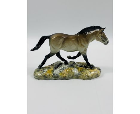 A large boxed Beswick limited edition sculpture Przewalski's Wild Horse, 654/1000, 24 x 10 x 17cms. Estimate £30-40.This item
