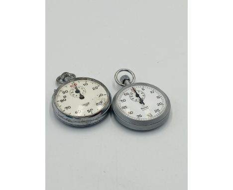 A Heuer chrome plated metal cased keyless wind open-faced stopwatch, dial with outer black Arabic numerals, detailed in red ‘