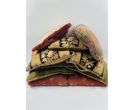 Ten feather filled cushions, largest cushion, cms. Estimate £20-30.This item qualifies for in-house posting.