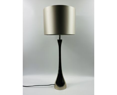 A stylish tall contemporary polished metal table lamp and shade by "Libra".88cms overall height x 15cms base diameter.Estimat