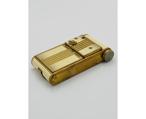 An early 20th century 1930s Art Deco musical vanity powder case compact, with removeable lipstick tube, pop-up mirror and pow