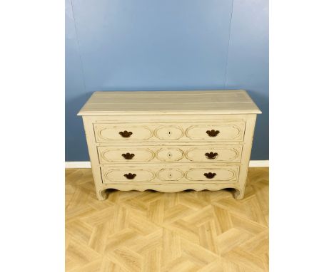 A contemporary French style paint decorated three drawer commode chest, with a plank top and panelled sides, peg and dowel co