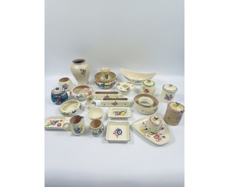 A collection of approximately 24 items of Poole pottery to include: preserve pots; vases; pin trays; and bowls. Estimate £20-