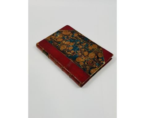 A 19th century leather bound book "Ancient Atlas",an atlas of ancient geography,published by John Arronsmith. 15.5cms wide x 