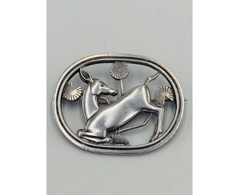 Georg Jensen silver brooch, no.256, in box. Estimate: £120-150.This item qualifies for in-house posting.