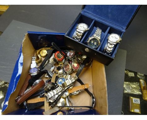 A box of mainly chronograph type watches