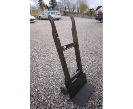 A set of vintage sack trucks