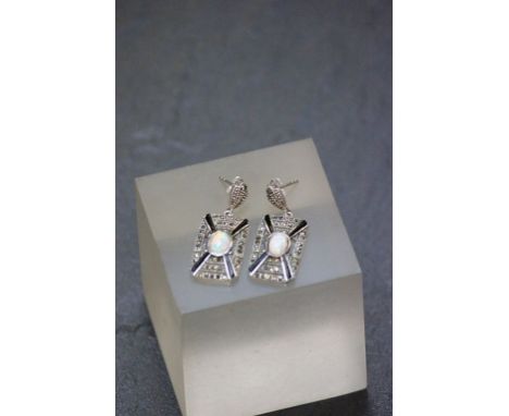 A pair of silver rectangular art deco style earrings with opal panel