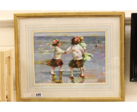 Gilt framed oil of girls playing on a beach