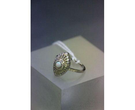 A silver CZ art deco style ring with central opal