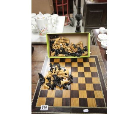 Vintage folding Rosewood chessboard and a box of vintage wooden Chess pieces