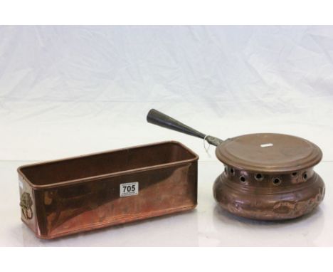 A small copper trough and a similar chestnut warmer.