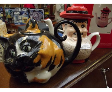 Peter Nook Desperate Dan novelty teapot together with a Carltonware teapot in the form of a cat