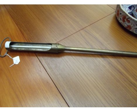 An early 20th century brass Negretti & Zambra ground thermometer / barometer