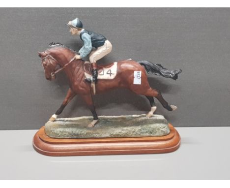 A VINTAGE BORDER FINE ARTS HORSE AND JOCKEY FROM 1978