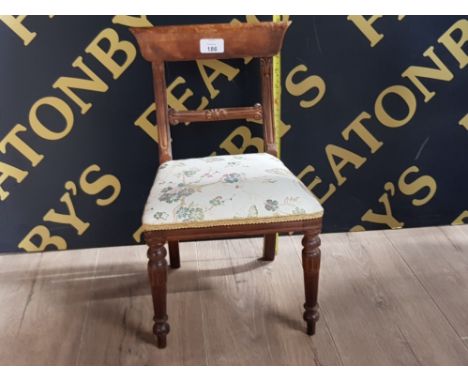 A VINTAGE OAK DOLLS CHAIR 44CM BY 27CM