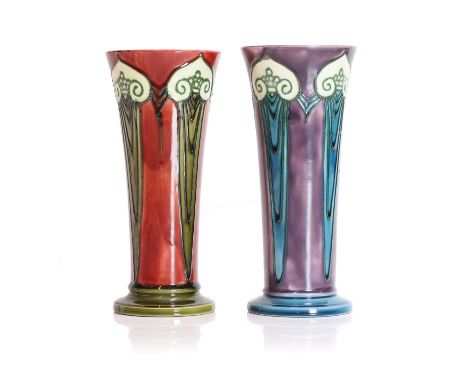 Two Minton Secessionist vases, dated 1914 and 1911, each of flaring form, one with a red ground, the other with a purple grou