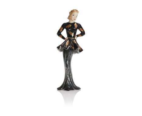 Claire Herczeg (Hungarian, 1906-1997), a Goldscheider pottery figure of a lady, c.1940, model no. 8169/3, wearing a black dre