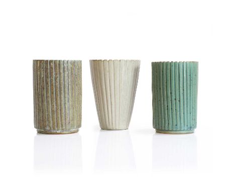 Arne Bang (Danish, 1901-1983) a group of three stoneware vases, c.1930, produced by Holmegaards Stentøj, each with linear dec