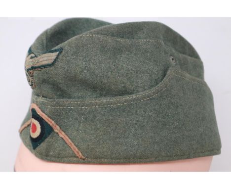 A German WWII Wehrmacht enlisted mans side cap. UK P&amp;P Group 2 (£20+VAT for the first lot and £4+VAT for subsequent lots)