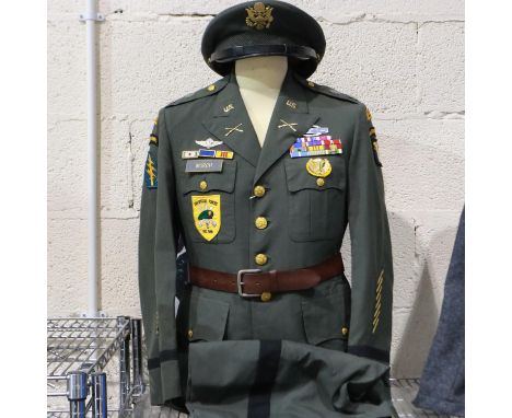 American Vietnam War period officers dress uniform, badged for Airborne Special Forces, displaying ribbon bars, embroidered c