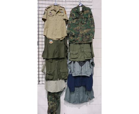 US military uniform shirts, trousers and coats, including examples marked USMC, USN, and US Army, most 1970s-90s, some named 