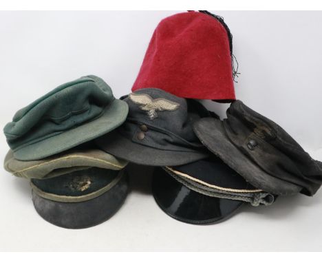 A collection of reenactors and aged replica caps and hats. UK P&amp;P Group 3 (£30+VAT for the first lot and £8+VAT for subse