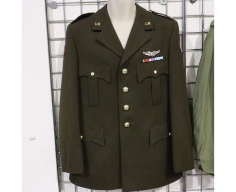An American post-war parade tunic, with pilots wings and ribbon bar. UK P&amp;P Group 2 (£20+VAT for the first lot and £4+VAT
