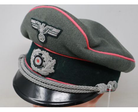A German Panzer officers visor cap, named to interior Lt E Kleine. Some mothing to band. UK P&amp;P Group 2 (£20+VAT for the 