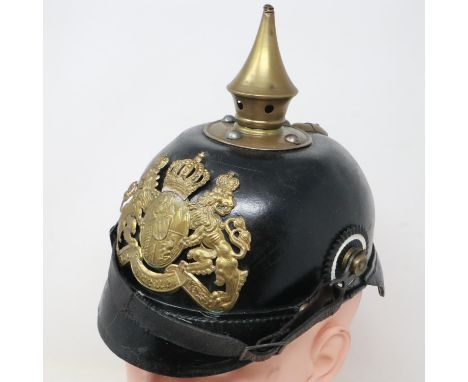An early 20th century Bavarian pickelhaube, leather bound with brass fittings and leather liner. UK P&amp;P Group 3 (£30+VAT 