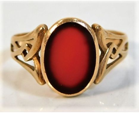 An antique 14ct gold ring with Celtic style shank set with chalcedony 3.2g size R