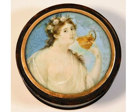 An early 19thC. tortoiseshell snuff box with hand painted portrait decor set with yellow metal ring (tests as gold) 2.75in di