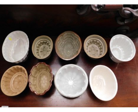 Nine antique ceramic jelly moulds 