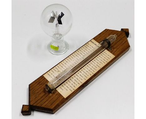 An oak mounted weather forecaster 15in high a/f &amp; one other item. Provenance: From Grade II Listed Tregada House, Cornwal