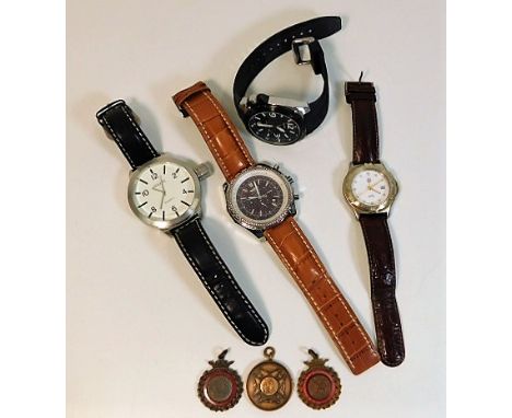 Four fashion watches including Casio twinned with three medals
