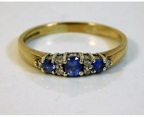 A 9ct gold diamond &amp; sapphire ring 2.5g size R