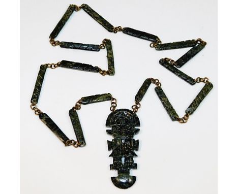A jade necklace with Aztec style figure 25in long 25g