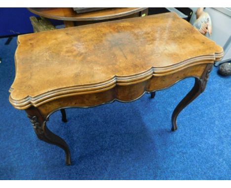 A mid 19thC. walnut card table with cabriole legs &amp; decorative edge 34in wide 