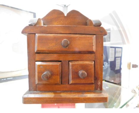 A small wooden trinket casket